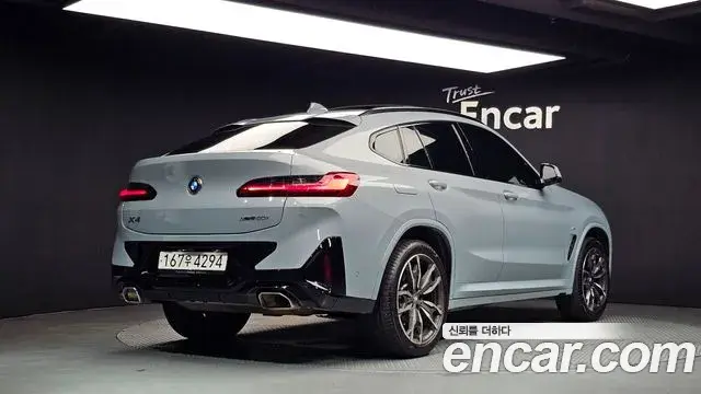 BMW X4 2024 — ფოტო 30/35