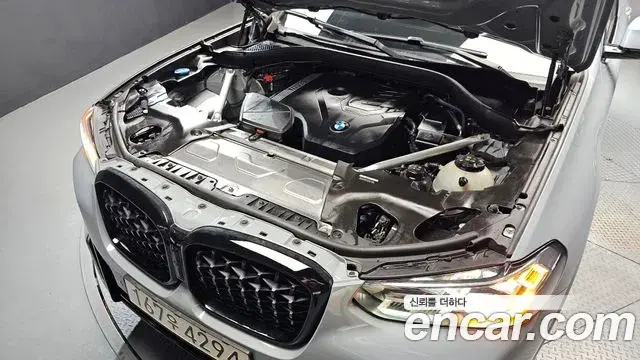 BMW X4 2024 — ფოტო 18/35