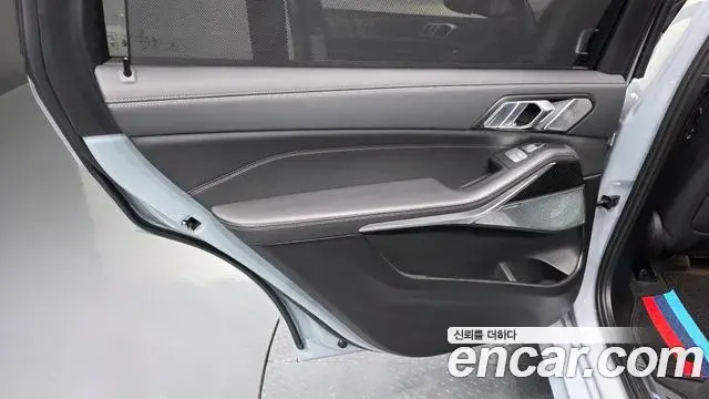 BMW X7 2024 — ფოტო 28/33
