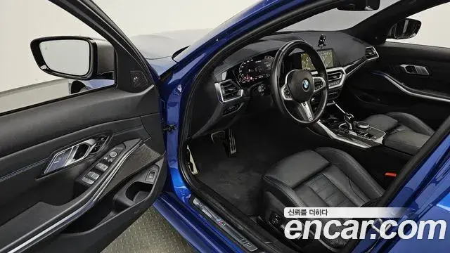 BMW 3 Series 2022 — Фото 10/20