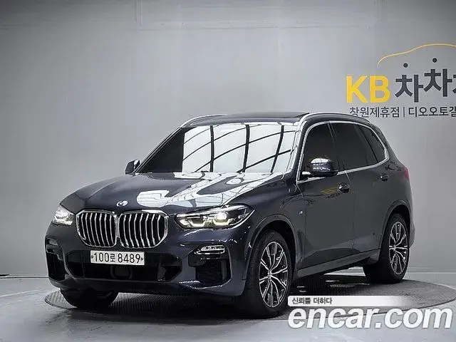 BMW X5 2020 — Фото 1/20