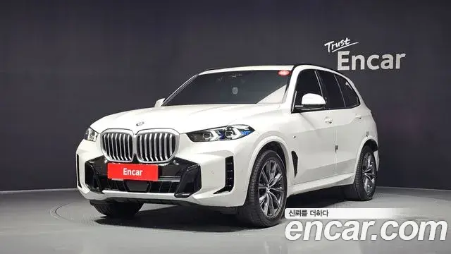 BMW X5 2024 — Фото 1/20