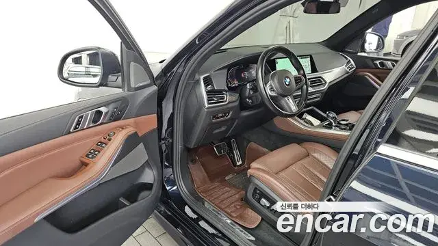 BMW X5 2022 — Фото 8/20