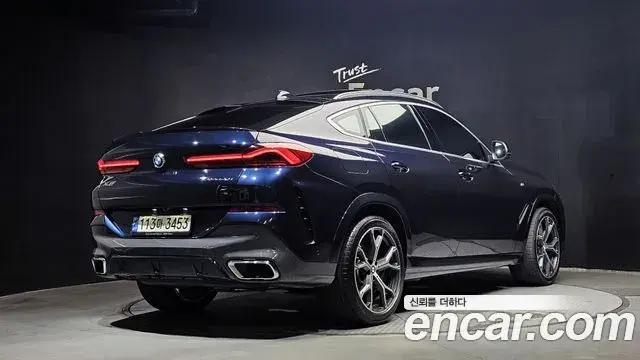 BMW X6 2021 — Фото 2/20