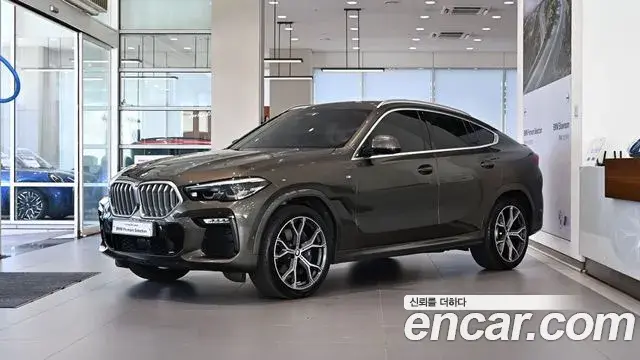 BMW X6 2021 — Фото 1/20