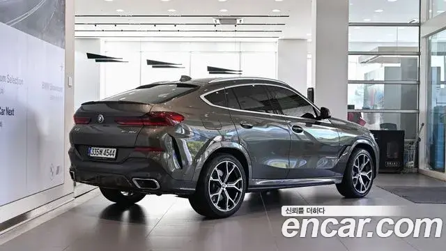 BMW X6 2021 — Фото 2/20