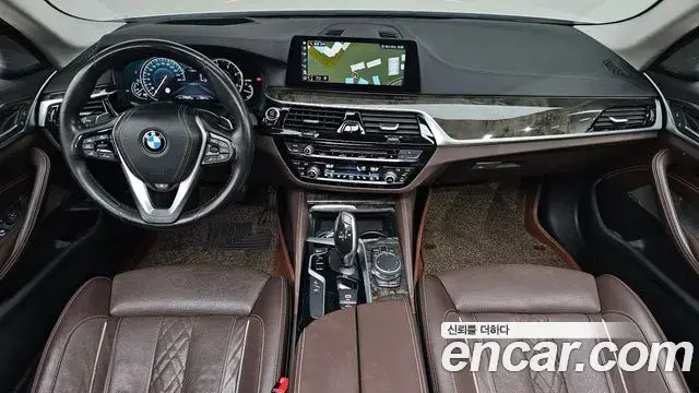BMW 5 Series 2018 — Фото 7/20