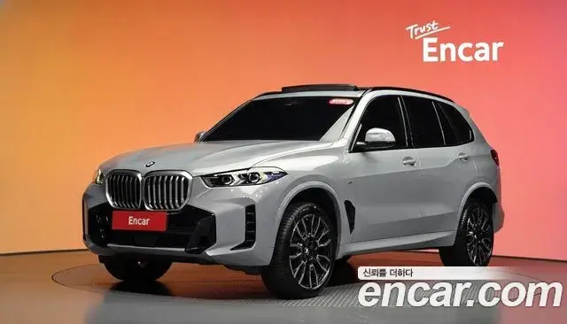 BMW X5 2023 — Фото 1/20