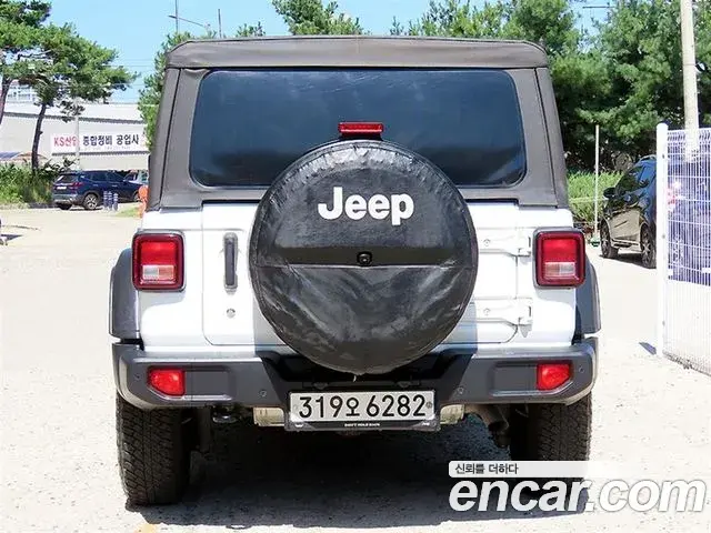 Jeep Wrangler 2019 — Фото 2/16