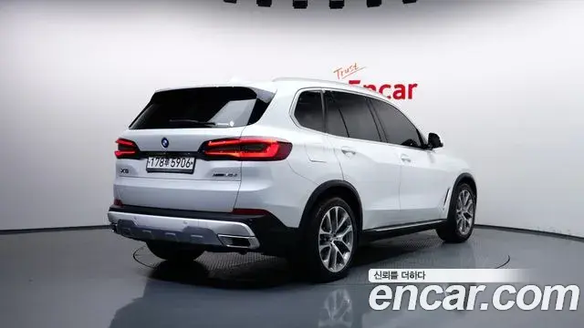 BMW X5 2020 — Фото 1/20