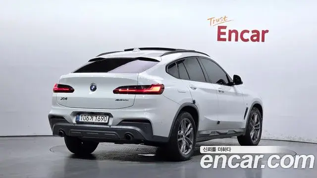 BMW X4 2021 — Фото 1/20