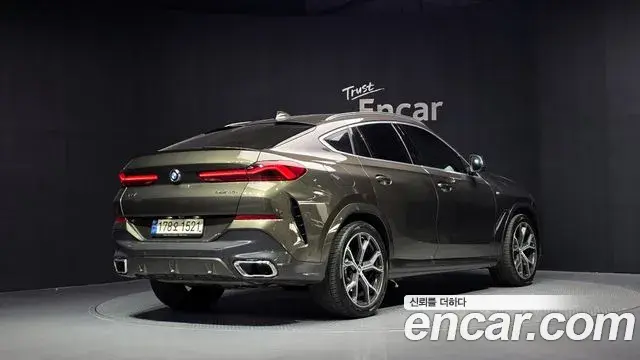 BMW X6 2022 — Фото 2/20