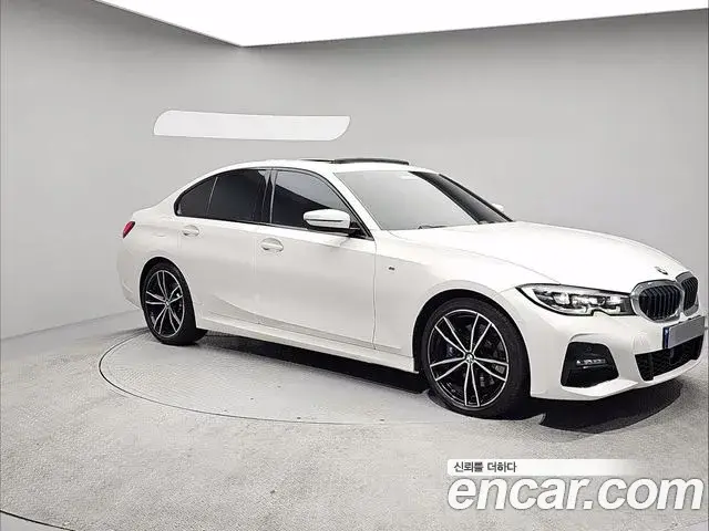 BMW 3 Series 2022 — Фото 1/20
