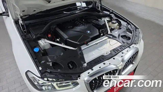 BMW X4 2022 — Фото 6/20