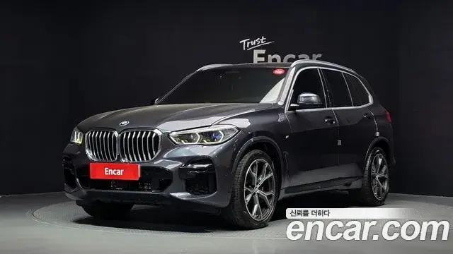BMW X5 2022 — Фото 1/20