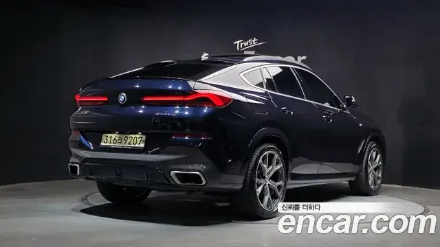 BMW X6 2020 — Фото 2/20
