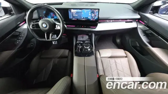 BMW 5 Series 2024 — Фото 10/20