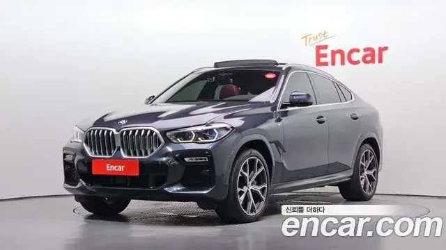 BMW X6 2021 — Фото 1/20