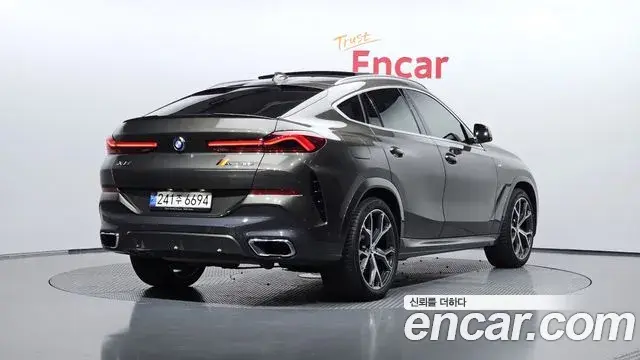 BMW X6 2021 — Фото 2/20