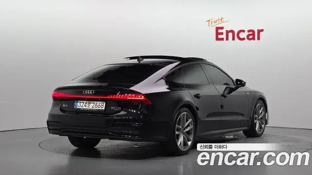 Audi A7 2023 — Фото 2/20