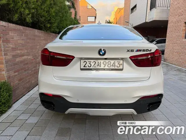 BMW X6 2018 — Фото 2/12