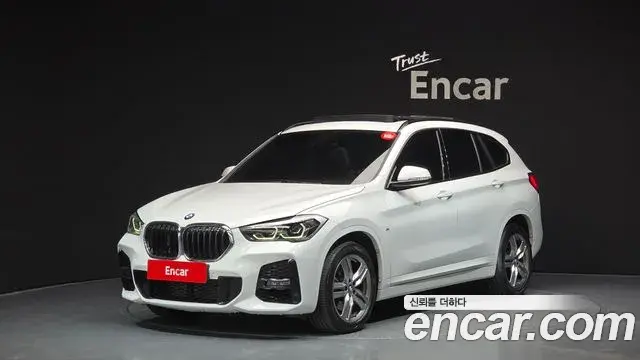 BMW X1 2021 — Фото 1/20
