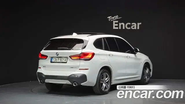 BMW X1 2021 — Фото 2/20