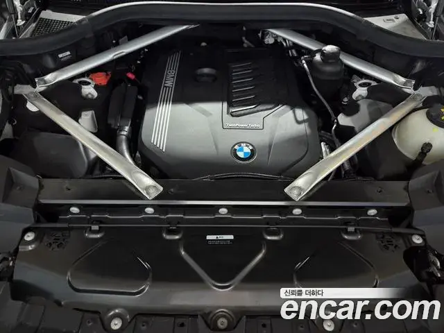 BMW X7 2021 — ფოტო 16/20