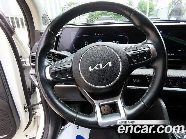 Kia Sportage 2021 — ფოტო 6/18