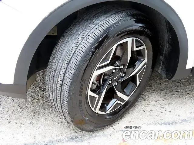 Kia Sportage 2021 — ფოტო 16/18