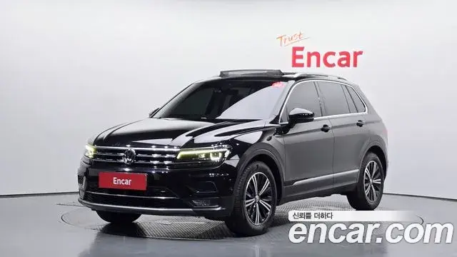 Volkswagen Tiguan 2019 — Фото 1/20