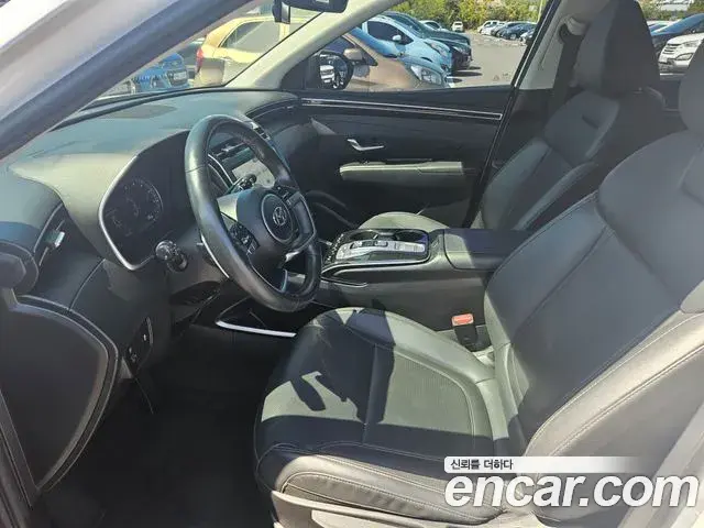 Hyundai Tucson Hybrid 2021 — ფოტო 9/20