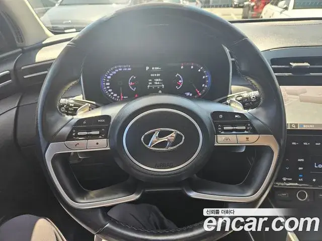 Hyundai Tucson Hybrid 2021 — ფოტო 14/20