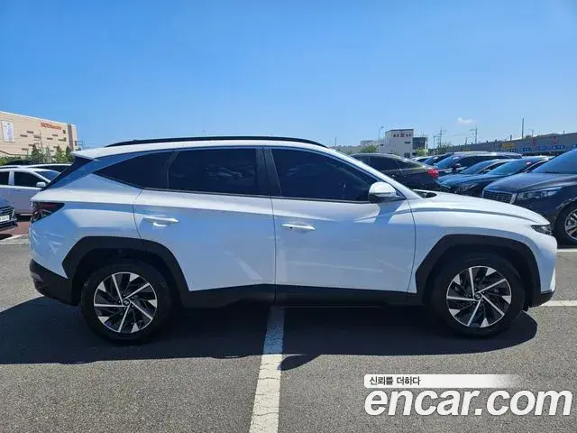 Hyundai Tucson Hybrid 2021 — ფოტო 11/20