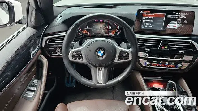 BMW 5 Series 2023 — Фото 12/20