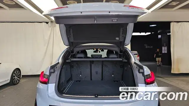 BMW X4 2024 — ფოტო 13/33