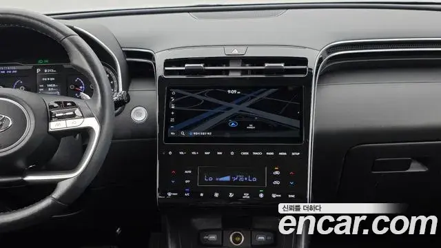 Hyundai Tucson Hybrid 2021 — ფოტო 10/20