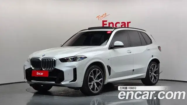 BMW X5 2024 — Фото 1/20
