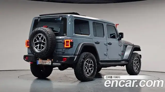 Jeep Wrangler 2024 — Фото 2/20