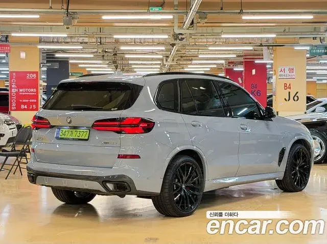 BMW X5 2024 — Фото 1/20