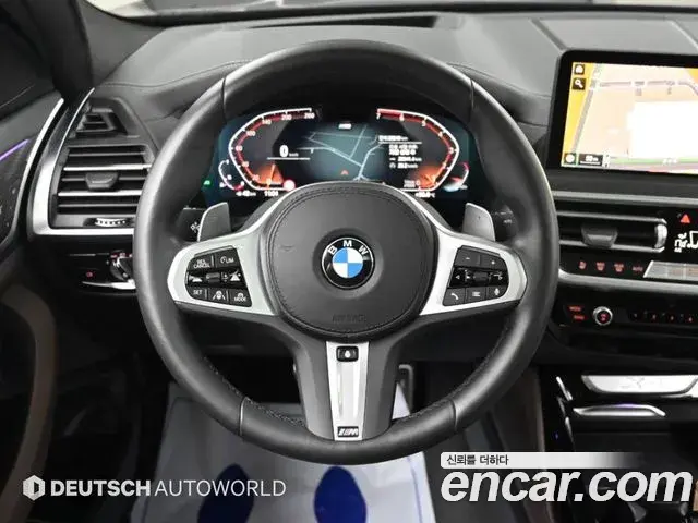 BMW X4 2024 — Фото 12/20