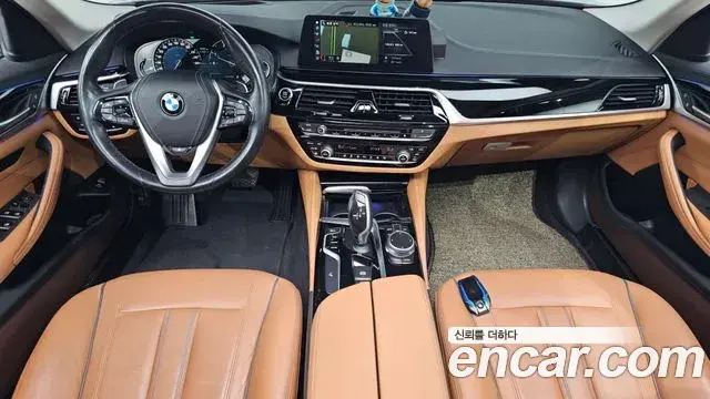 BMW 5 Series 2018 — Фото 7/20
