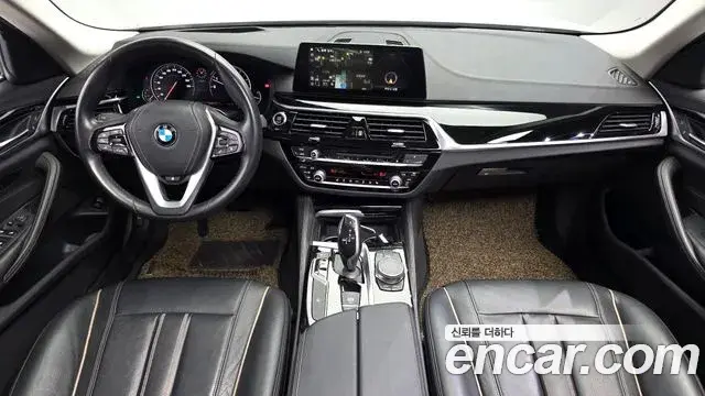 BMW 5 Series 2018 — Фото 7/20