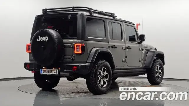 Jeep Wrangler 2023 — Фото 2/20