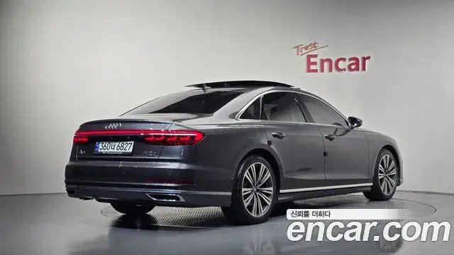 Audi A8 2021 — Фото 2/20
