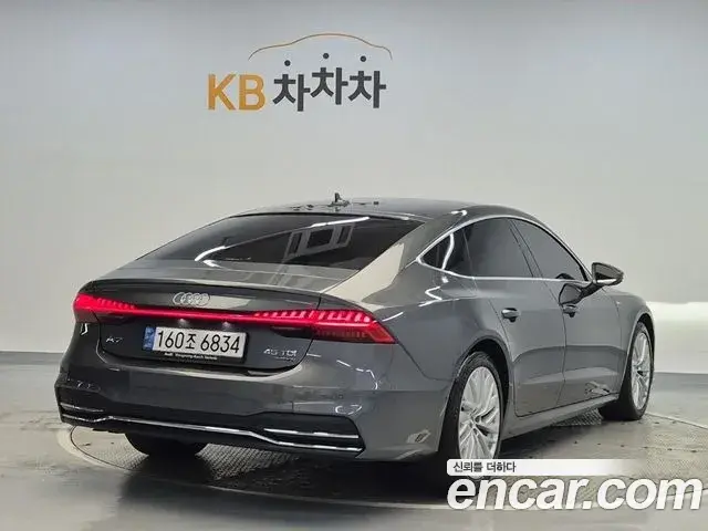 Audi A7 2021 — Фото 2/19