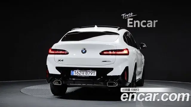 BMW X4 2024 — Фото 4/20