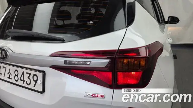Kia Seltos 2021 — ფოტო 7/30