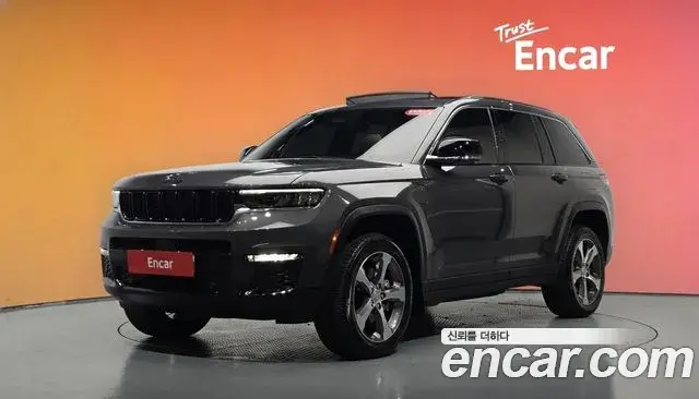 Jeep Grand Cherokee 2023 — Фото 1/20