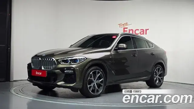 BMW X6 2021 — Фото 1/20